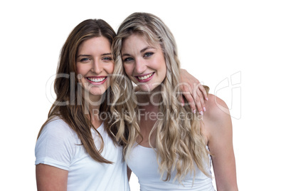 Happy female friends together with arms around