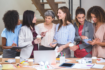 Group of interior designer interacting with each other
