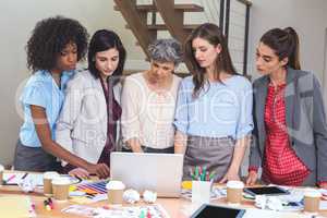 Group of interior designer using laptop