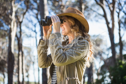 Woman using binoculars