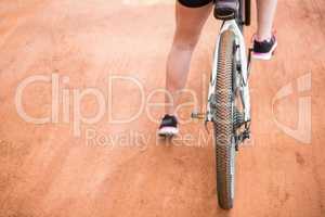 Close-up of woman cycling