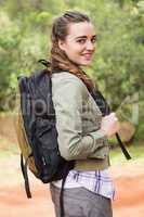 Smiling woman with backpack