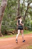 Fit healthy woman jogging