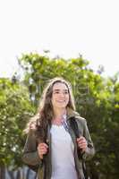 Smiling woman with backpack