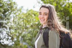 Smiling woman with backpack