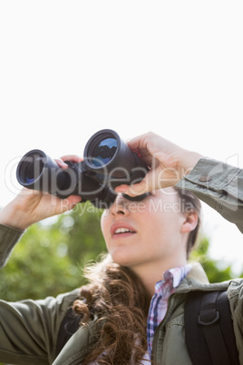 Woman using binoculars