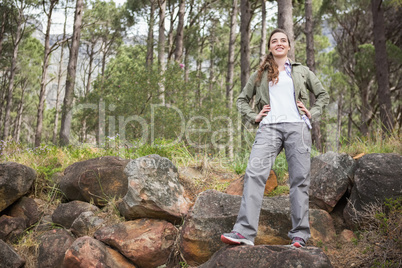 Woman standing with hands on hips