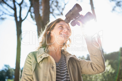 Woman using binoculars