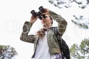 Woman using binoculars