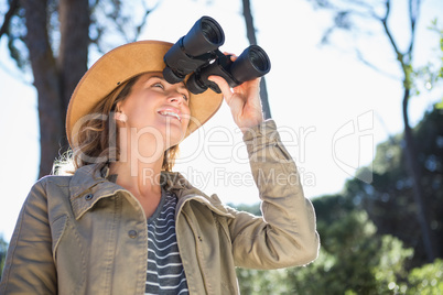 Woman using binoculars