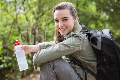 Woman holding water bottle