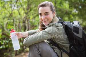 Woman holding water bottle