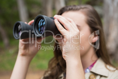 Woman using binoculars