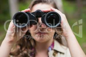 Woman using binoculars