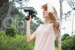 Woman using binoculars