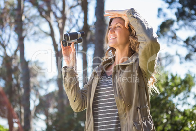 Woman holding binoculars