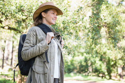 Smiling woman with backpack