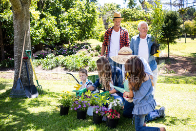 Multi-generation family gardening in the park