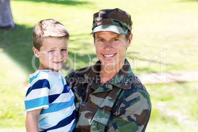 Happy soldier reunited with his son