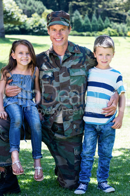 Happy soldier reunited with his son and daughter