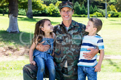 Happy soldier reunited with his son and daughter