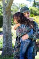 Happy soldier reunited with her daughter