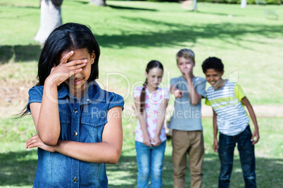 Friends teasing a girl