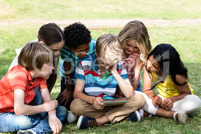 Children using digital tablet