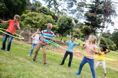 Children playing with hula hoops