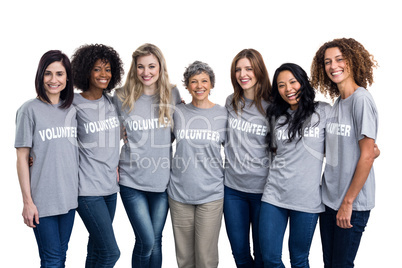 Portrait of happy volunteers standing together