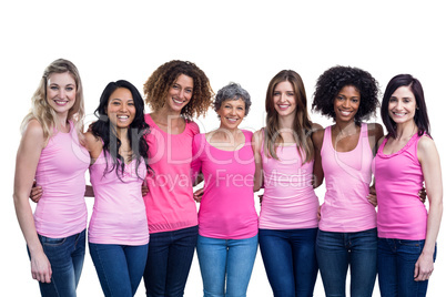 Happy multiethnic women standing together with arm around