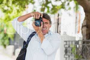 Man photographing from camera