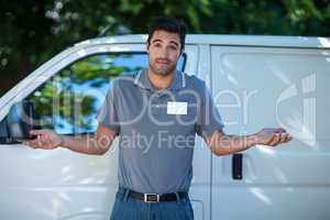 Portrait of delivery person gesturing