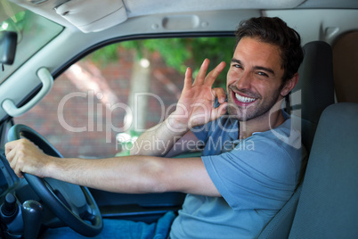 Portrait of happy man with ok sign