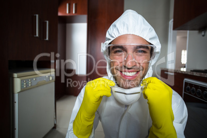 Portrait of happy worker in kitchen