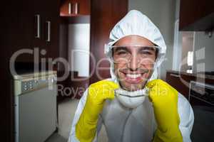 Portrait of happy worker in kitchen