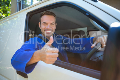 Mechanic sitting in his car