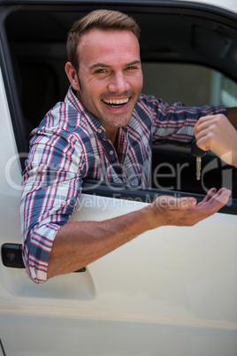 Young man receiving car keys