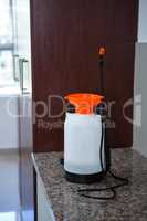 Insecticide sprayer on kitchen worktop
