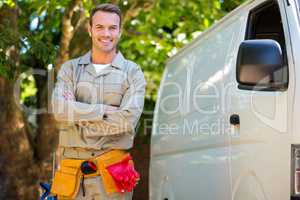 Handyman with tool belt around waist