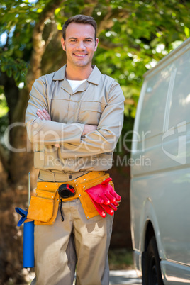 Handyman with tool belt around waist