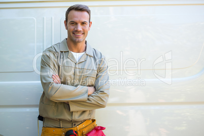 Handyman with tool belt around waist