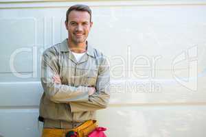 Handyman with tool belt around waist