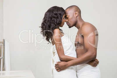 Young couple standing face to face