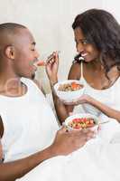 Young couple having breakfast