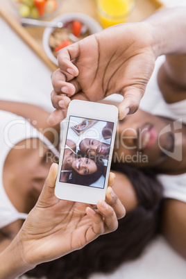 Young couple taking a selfie