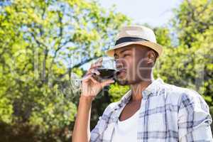 Young man drinking wine