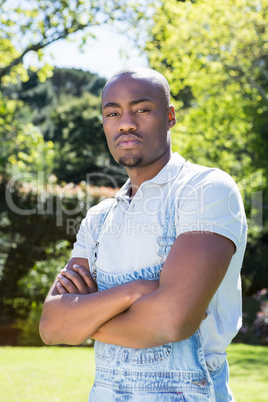 Young man standing in garden