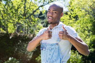 Young man standing in garden