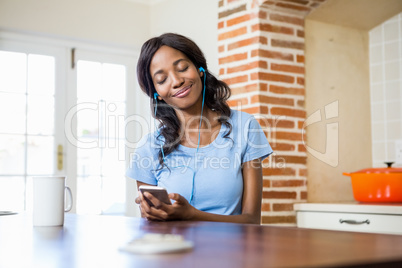 Young woman listening to music